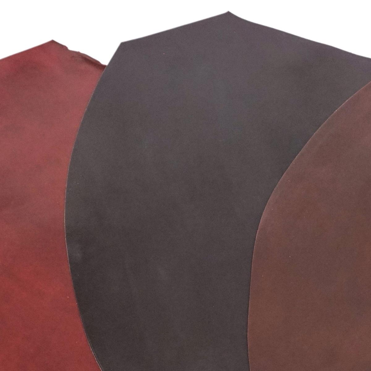 3 shell cordovan pieces in black, brown, and burgundy