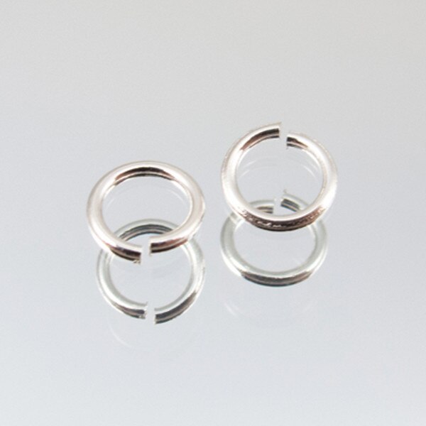 144-1008.SLC.jpg 25pk 6mm Silver Jump Rings Image