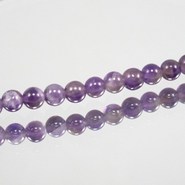 222-4117.SLC.jpg StrandSemiPreAmethyst8mm Image