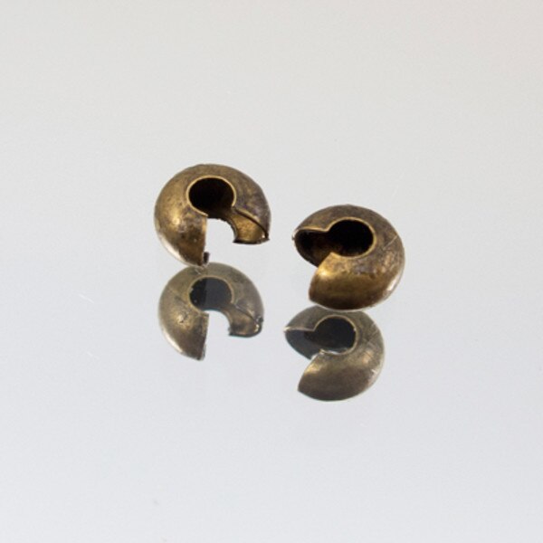 229-156.SLC.jpg 4mm Antique Brass Crimp Cover -144pk Image
