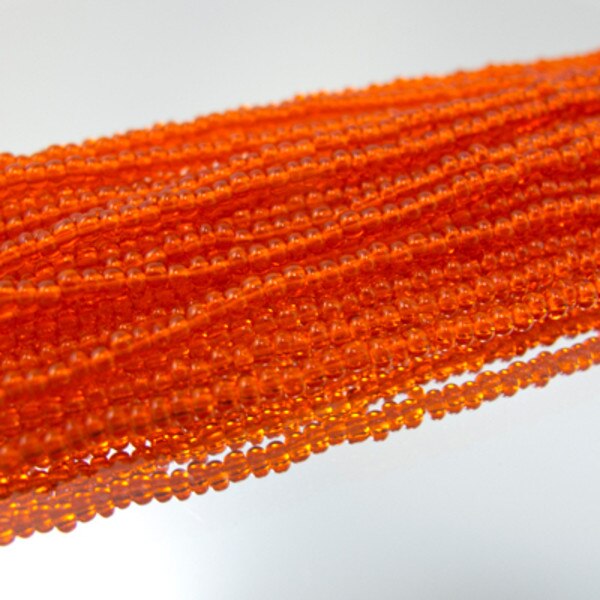26-110122.SLC.jpg 11/0 Seed Beads - Transparent Orange Image