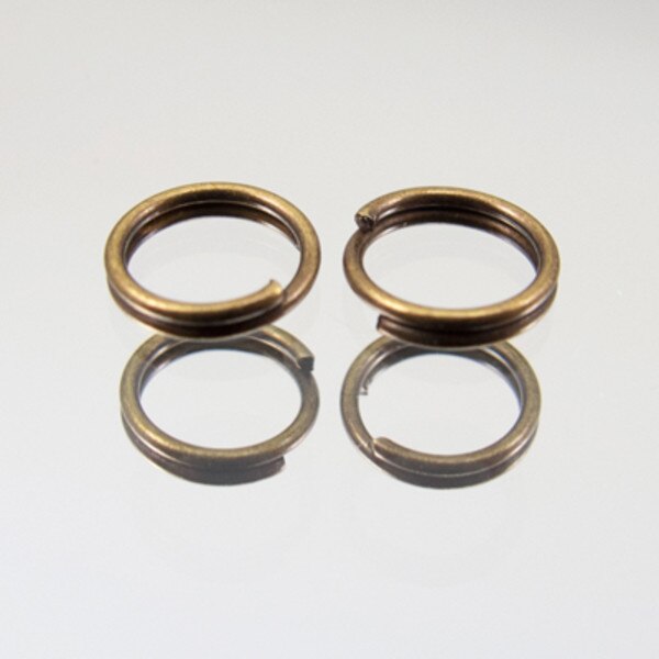 339-135.SLC.jpg Split RingsAnt.Brass6mm25pk Image