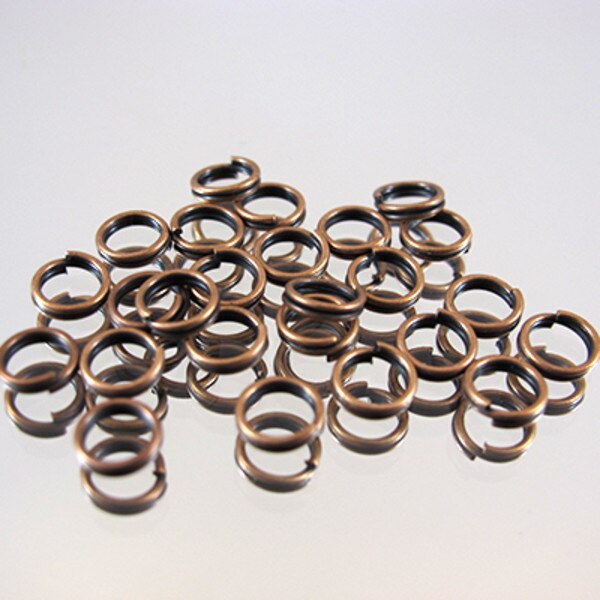 339-137.SLC.jpg Split RingsAnt.Copper6mm25pk Image