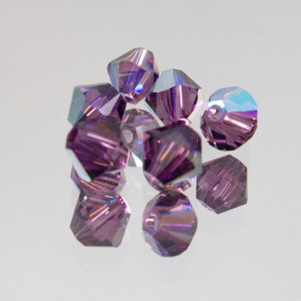 45-1100.SLC.jpg SwarovskiBiconeAmethystAB4mm72pk Image