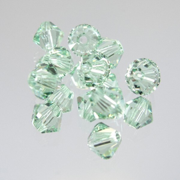 45-1111.SLC.jpg SwarovskiBiconeChrysolite4mm72pk Image