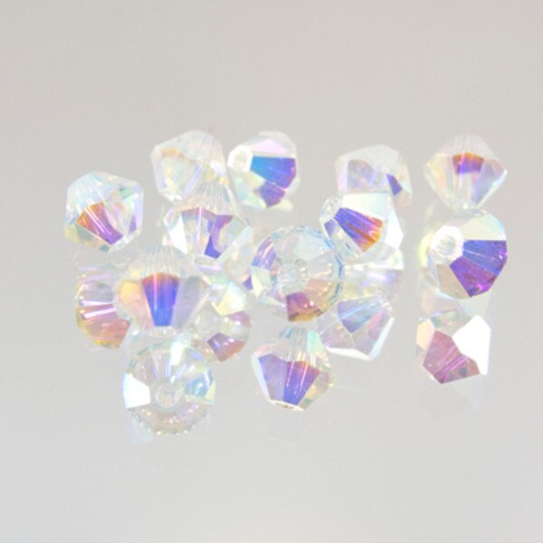 45-1116.SLC.jpg SwarovskiBiconeCrystal2AB4mm72pk Image