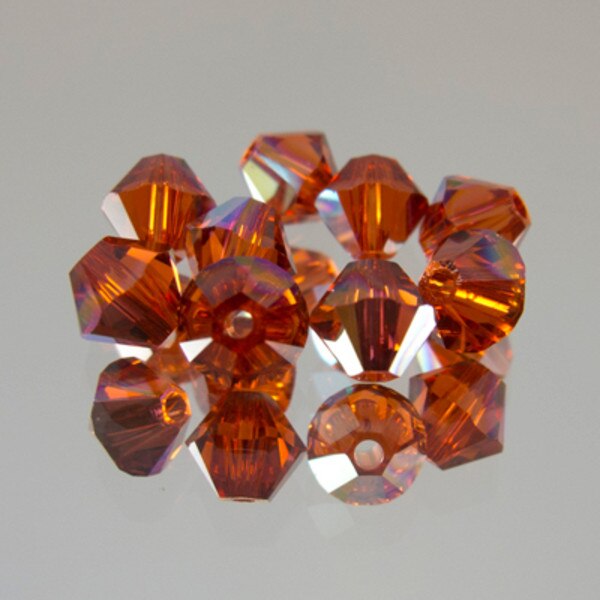 45-1134.SLC.jpg SwarovskiBiconeIndianRedAB4mm72pk Image