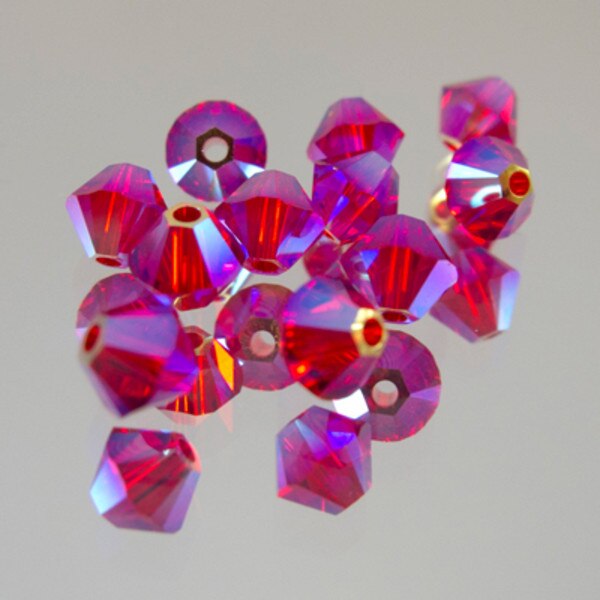 45-1155.SLC.jpg SwarovskiBiconeLtSiamAB4mm72pk Image