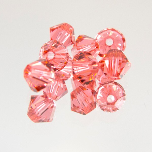 45-1165.SLC.jpg SwarovskiBiconePadparads4mm72pk Image