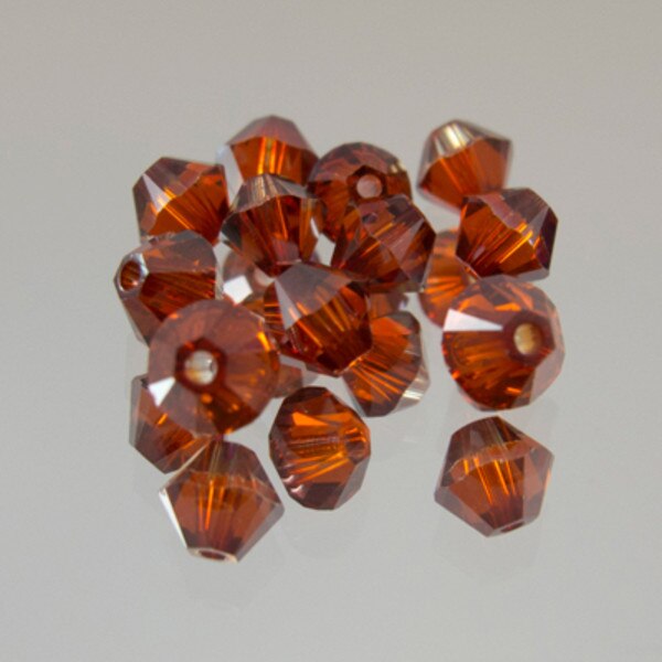 45-1172.SLC.jpg SwarovskiBiconeRedMagma4mm72pk Image