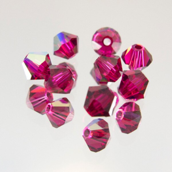 45-1177.SLC.jpg SwarovskiBiconeRubyAB4mm72pk Image