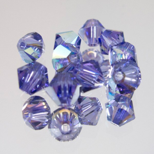 45-1185.SLC.jpg SwarovskiBiconeTanzaniteAB4mm72pk Image