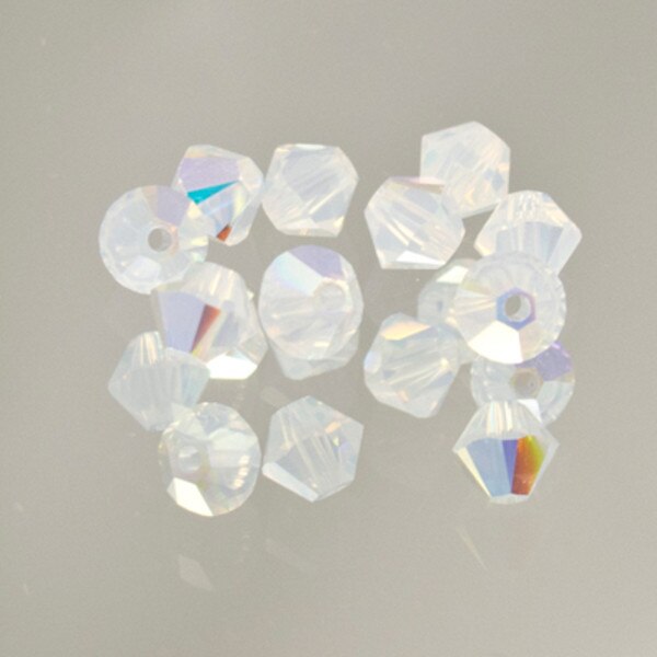 45-1195.SLC.jpg SwarovskiBiconeWhtOpalAB4mm72pk Image