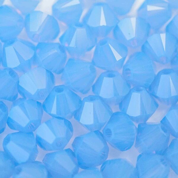 45-1225.SLC.01.jpg SwarovskiBiconeAirBlueOpal4mm72pk Image