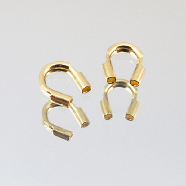 45-9401.SLC.jpg Wire Guardians - Gold Plate 12pk Image