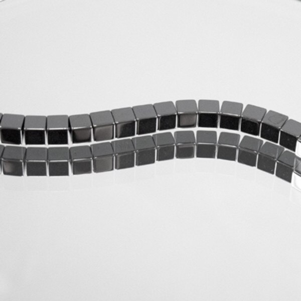 910-7.SLC.jpg StrandCubeHematite4x4mm Image